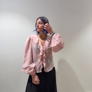 Blusa con lacci e volant