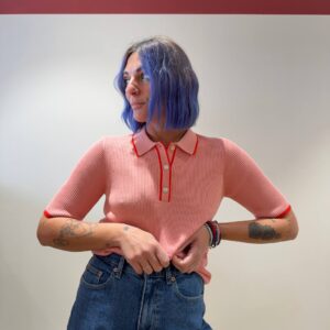 Polo di filo rosa con bordino rosso