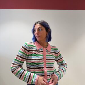 Polo traforata con bottoni